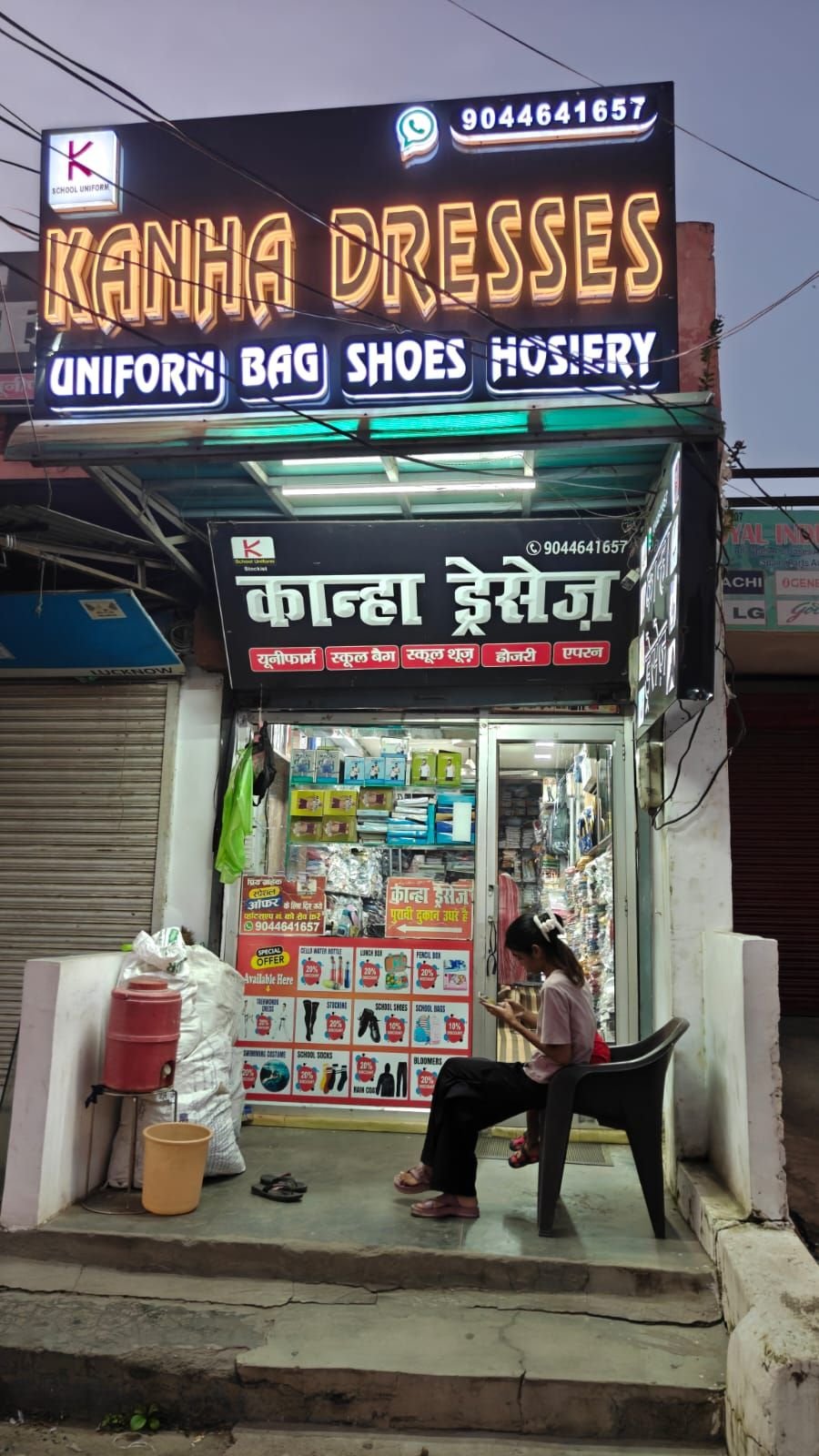 Kanha Dresses store front at night