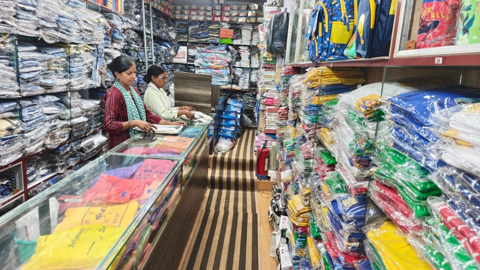 Uniform racks inside Kanha Dresses